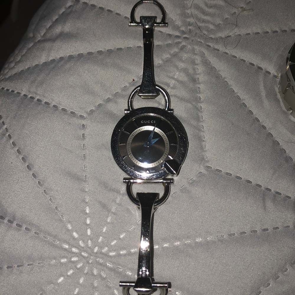 Gucci stainless w black face